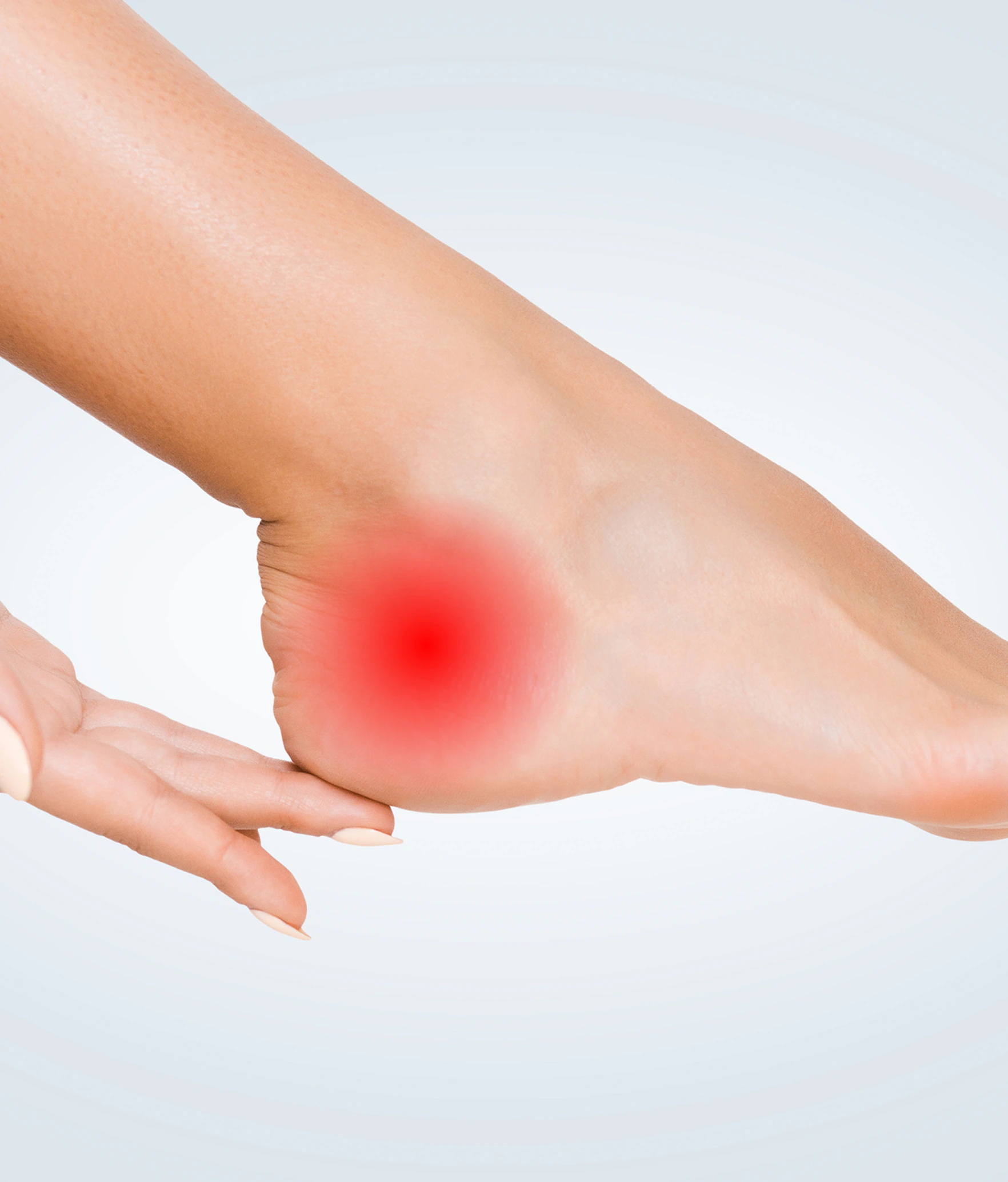 The inner ankle, where the tibial nerve passes through the tarsal tunnel